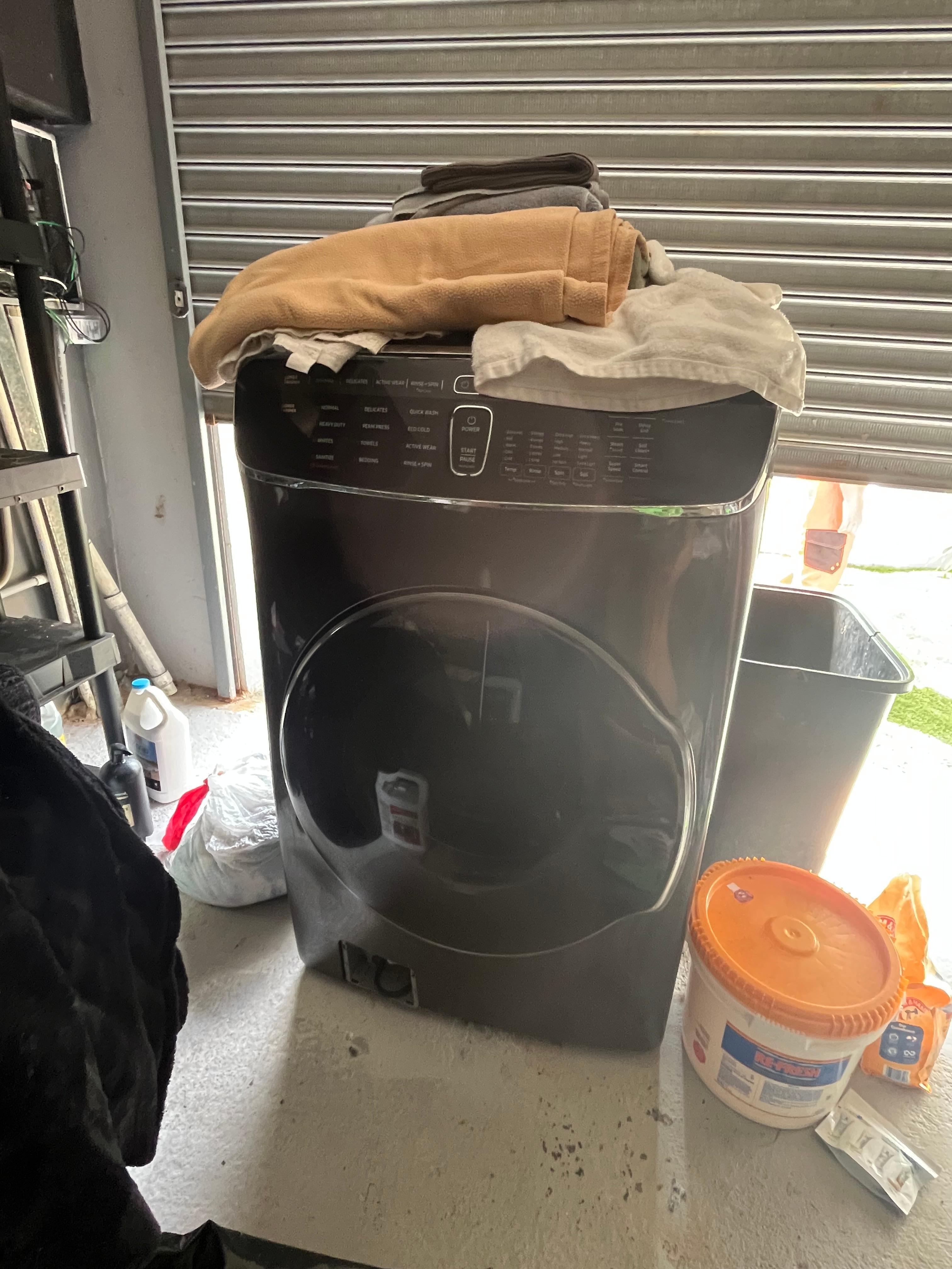 Storage where laundry machines were kept locked, opened by staff last day