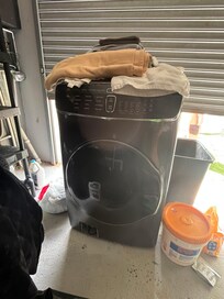 Storage where laundry machines were kept locked, opened by staff last day