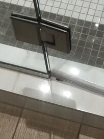 Gunk around the shower entrance