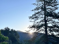 There is lots of natural lighting and a beautiful view of sunrises.