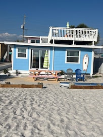 Being tight on the sandy beach was cool! And the surfboard shower was a fun addition.