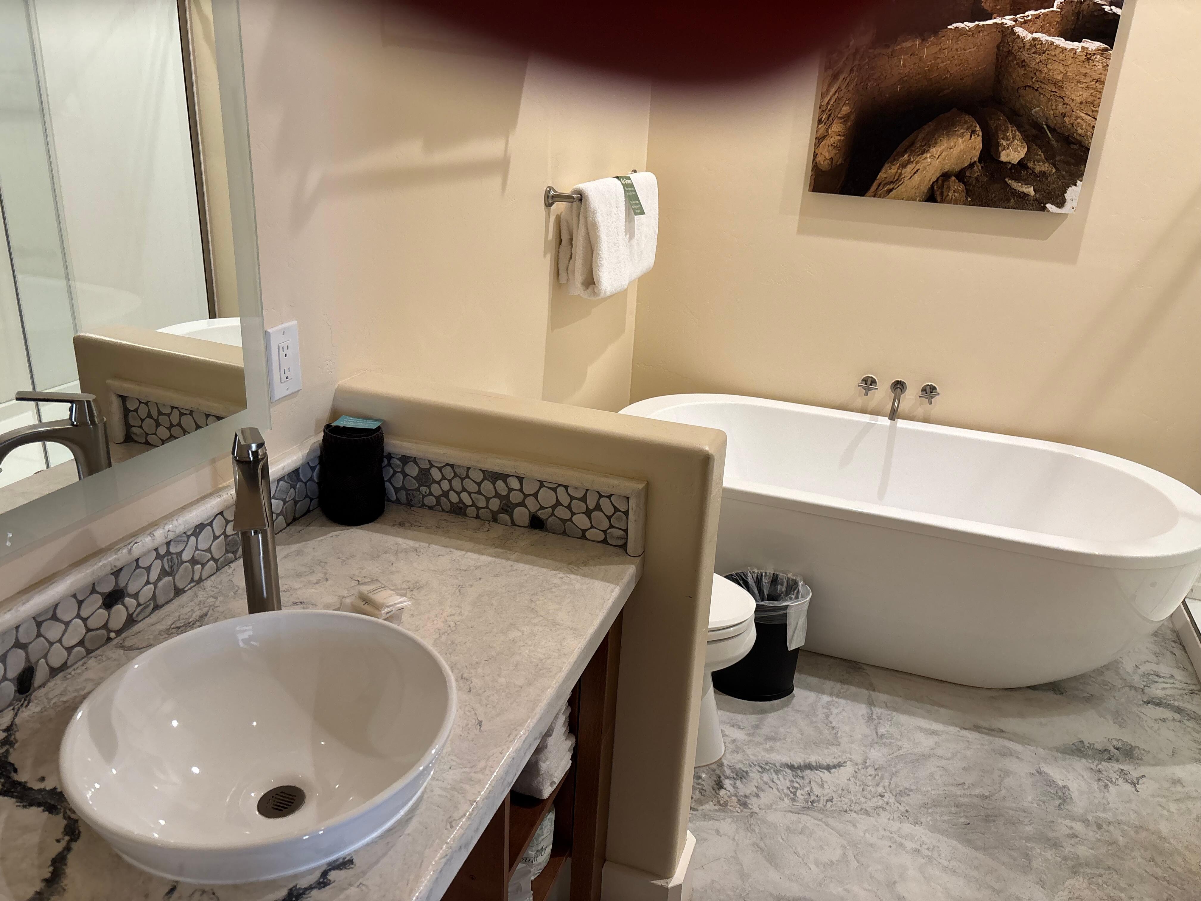 Huge bathroom with an oversized bathtub