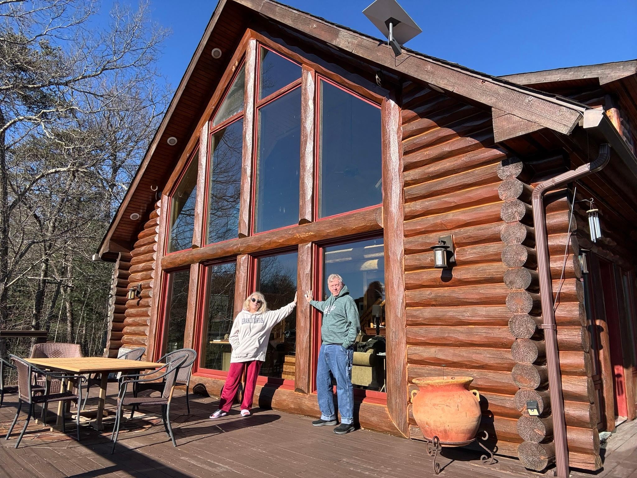 Panoramic windows and a large deck