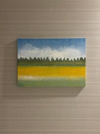 ๅฃใซ็ตตใ้ฃพใฃใฆใใใพใใ