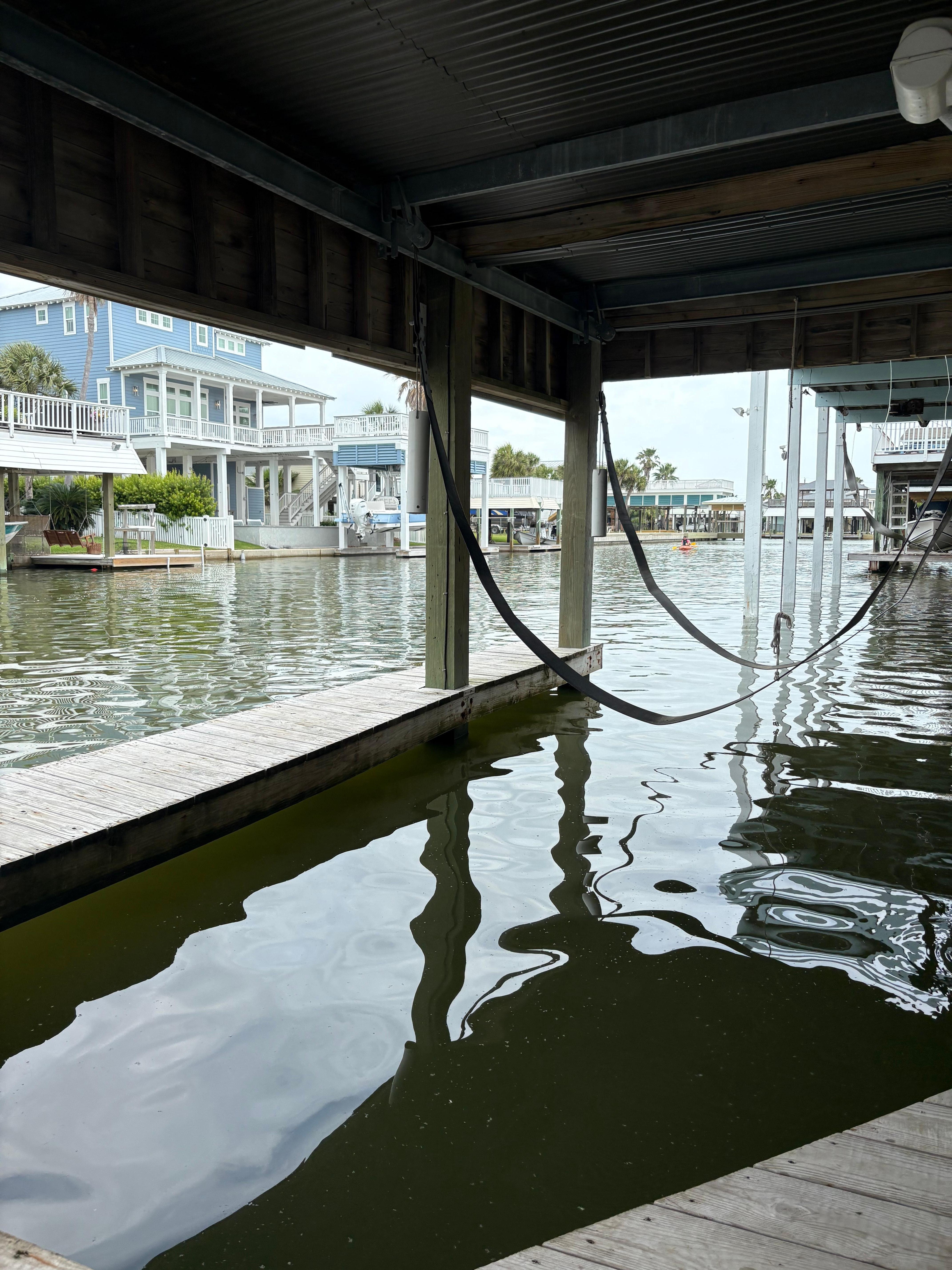 Great view down the wide canal and boat lift.   