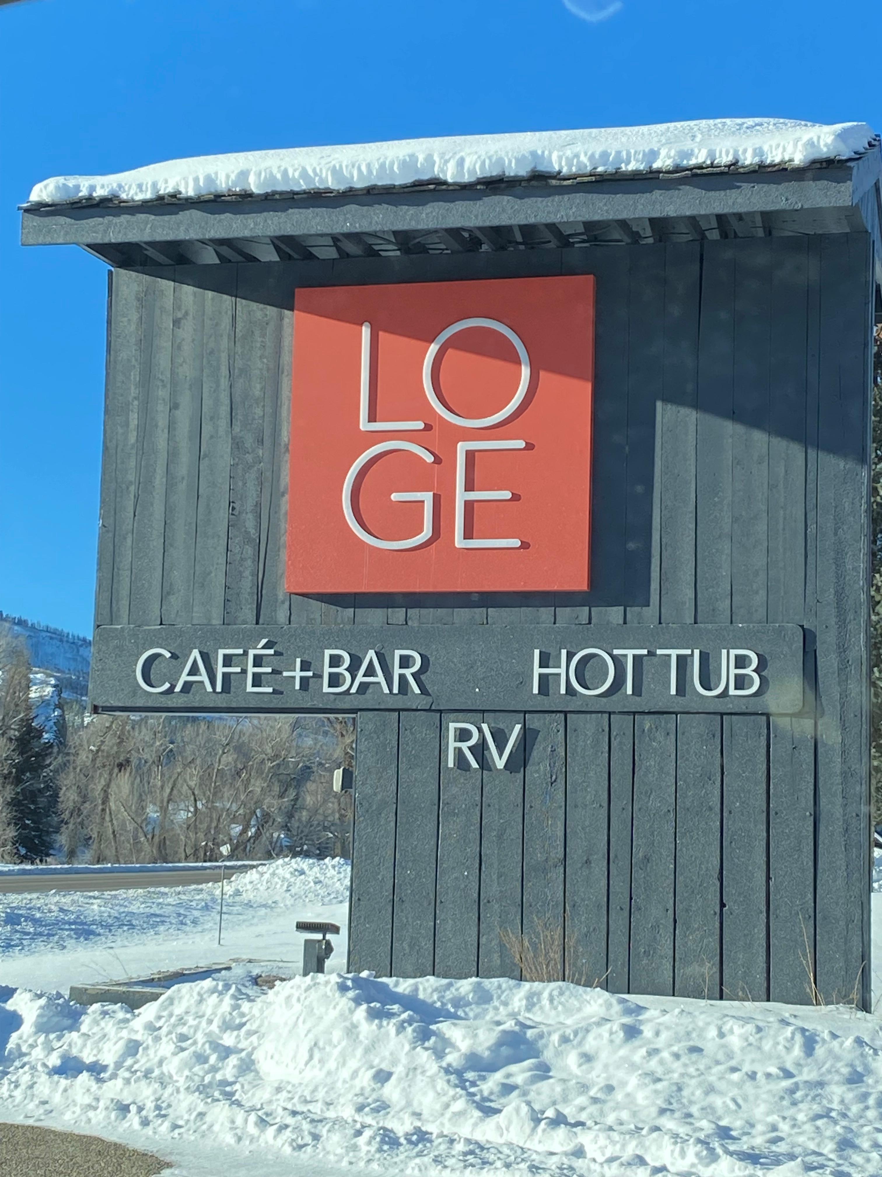 Sign broadcasting “hot tub” as primary amenity 
