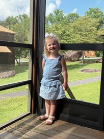 Our daughter on the porch one evening.