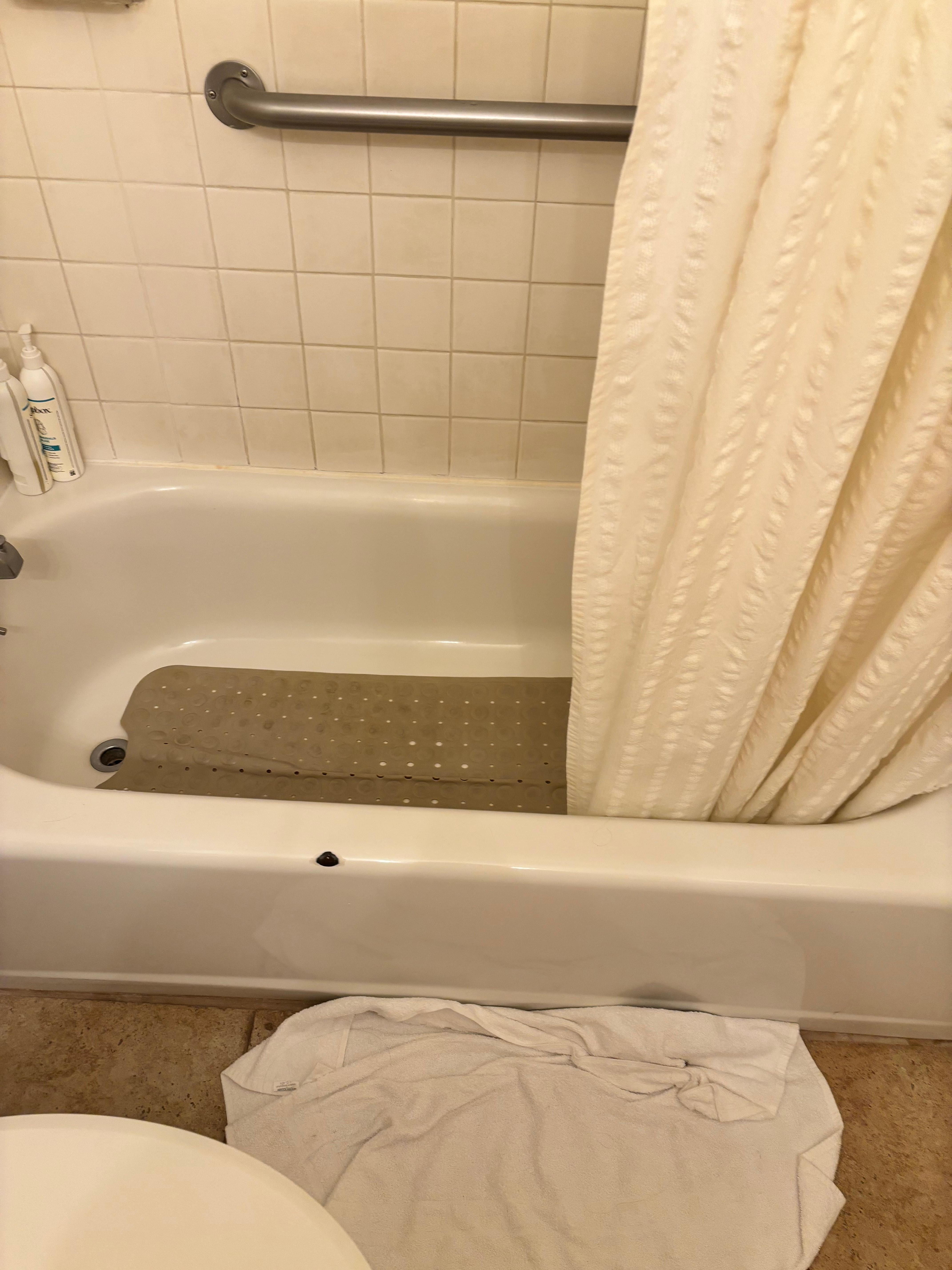 Chipped tub and unsafe mat
