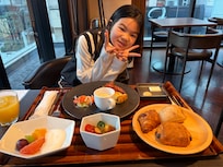 My grandaughter with our breakfast for the day.