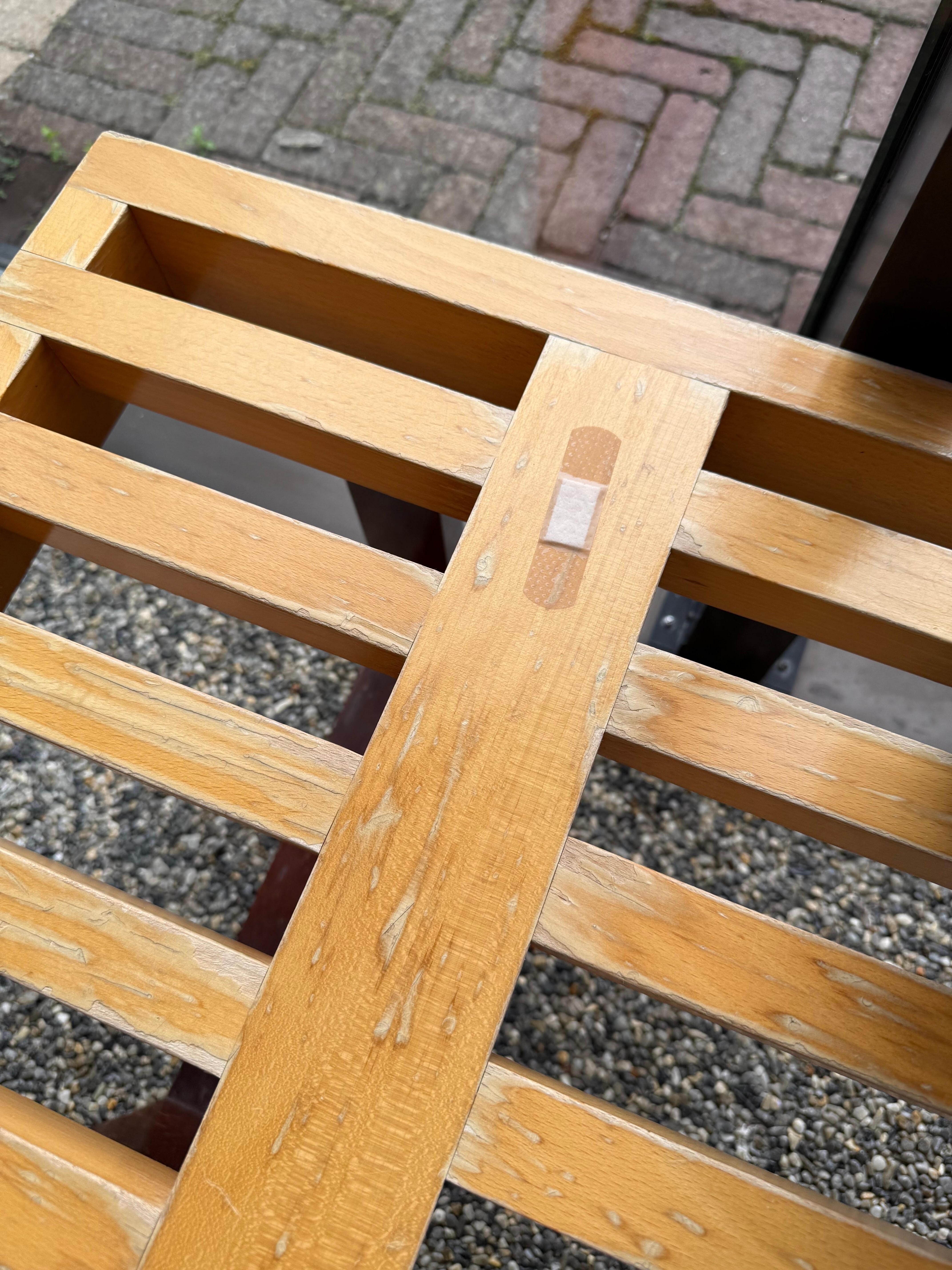 A bandaid on the only available bench on the inside portion of the pool. Four other chairs were taken by used towels and 2 chairs were used by other guests.