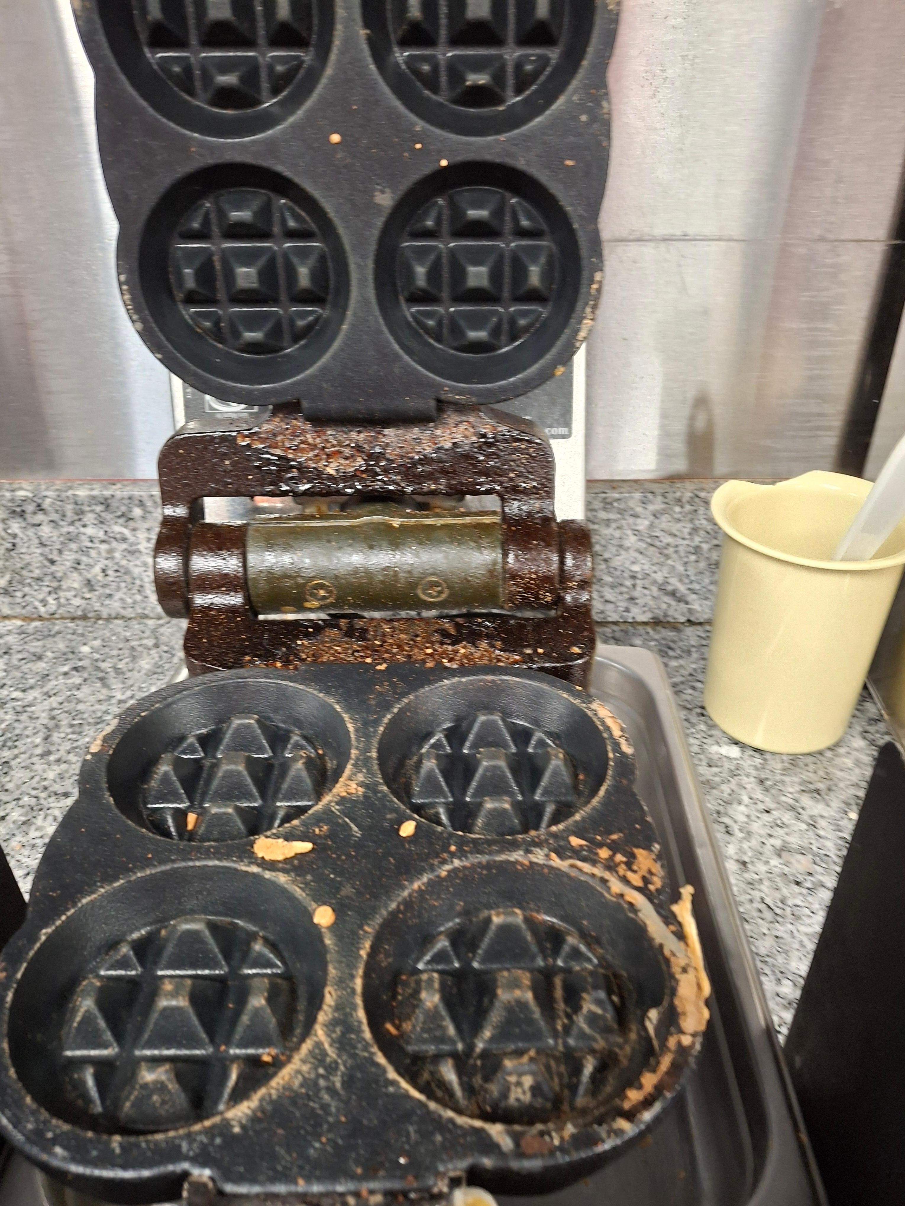 This was the waffle maker.  Disgusting and the room stunk like urine. 