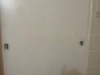 Broken/missing towel rack.