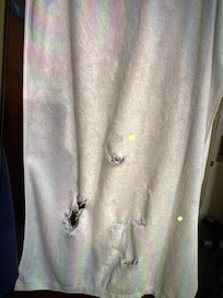 Towel with holes