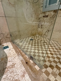 Shower door damaged, extremely dangerous