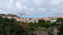 This was taken 'uphill' from the property. The white building in the middle is the place. GREAT view, GREAT access to the city.