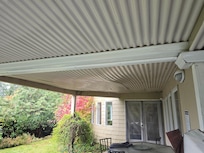 This "ceiling" is missing many screws, and swells until enough water drains out of leaks. Cool idea...needs reinforcement so it doesnt fall when someone is there