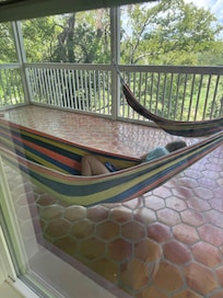 Screened in bottom porch w hammocks x2