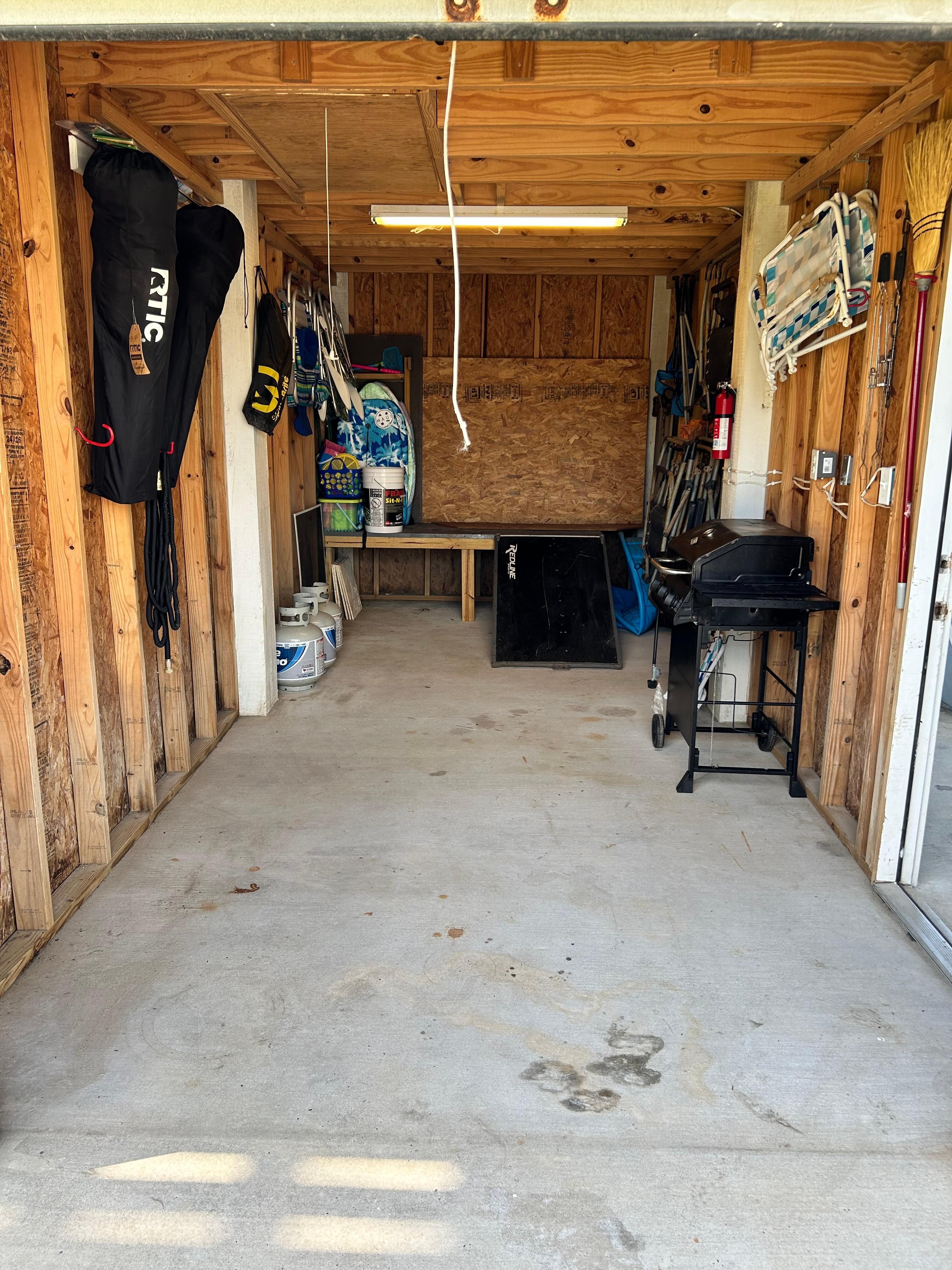 Garage below with items and where you can store your wagons. 