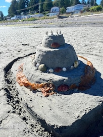 Our sandcastle creation on the beach just steps from our door!