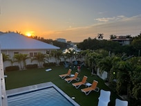 View of sunset and backyard from second level
