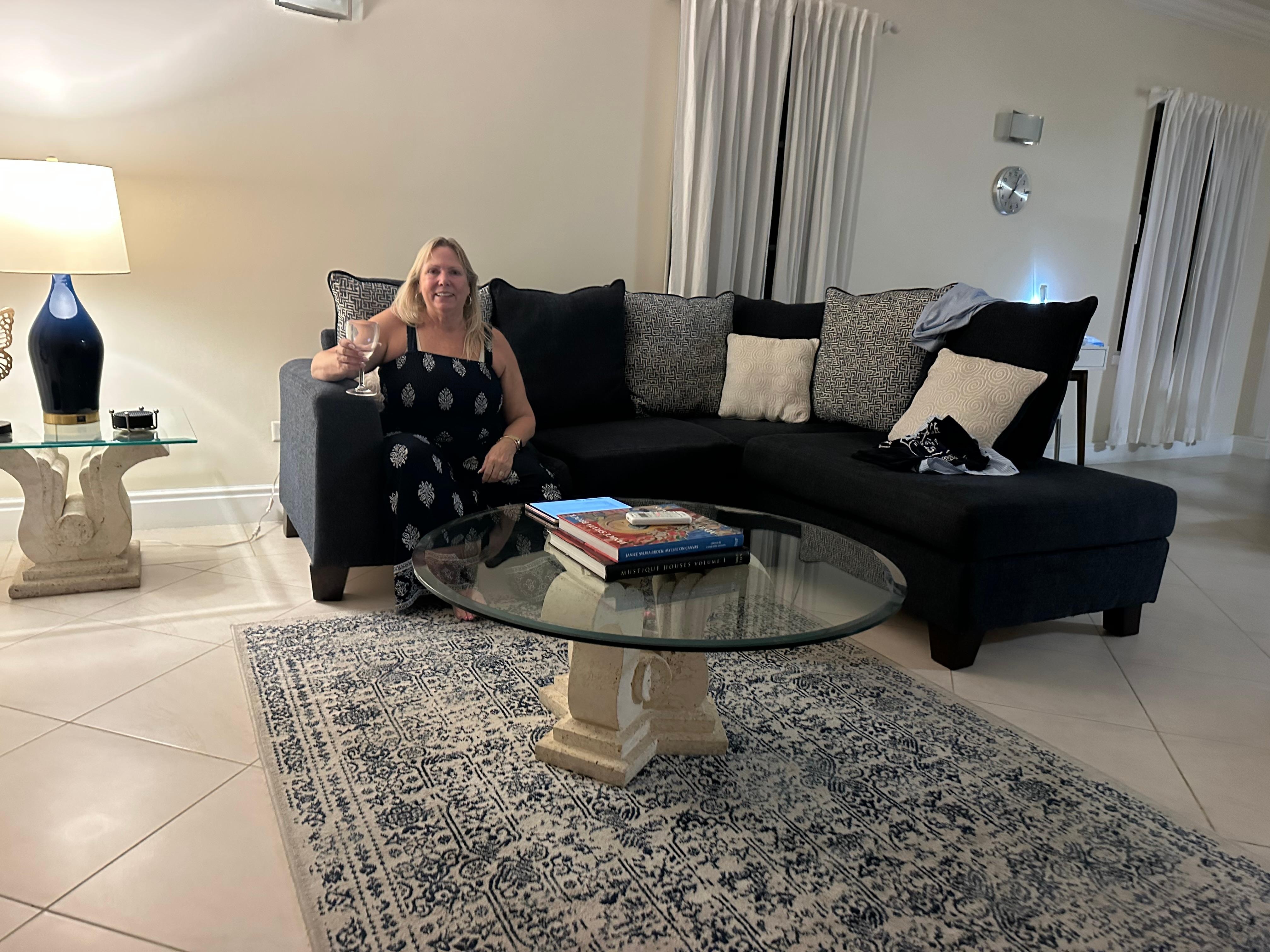 The generous sized living area Is very welcoming and follows the blue and white beachy theme.