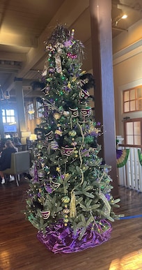 Mardi Gras tree in lobby.