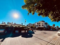 Some restaurants right outside the gate. Gate is manned my staff 24 hrs. Very safe