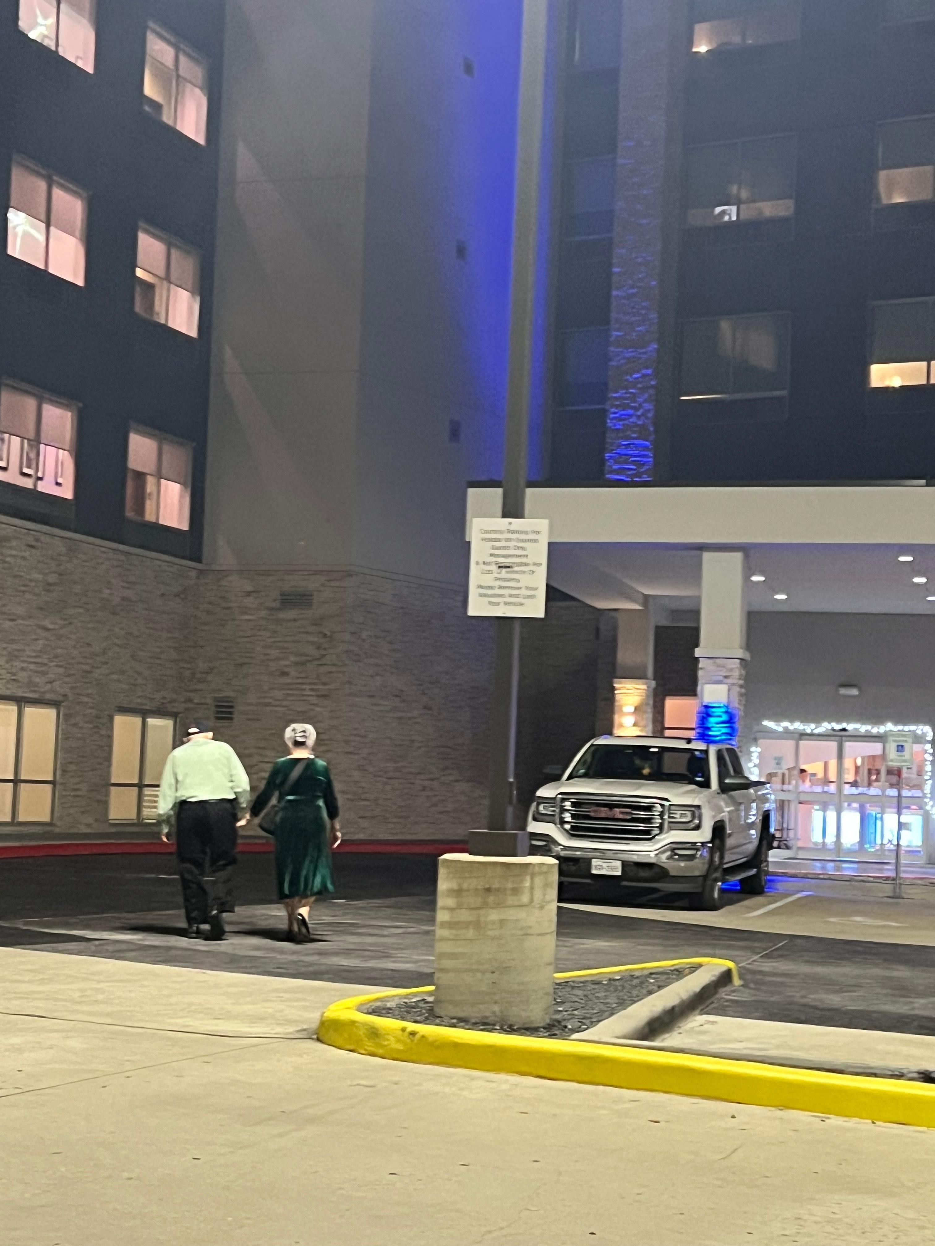 Love the free and safe parking.  My folks walking back in after a fun evening out with family.