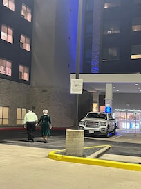 Love the free and safe parking. My folks walking back in after a fun evening out with family.