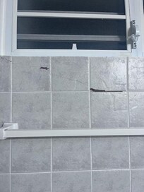 cracked tiles in bathroom