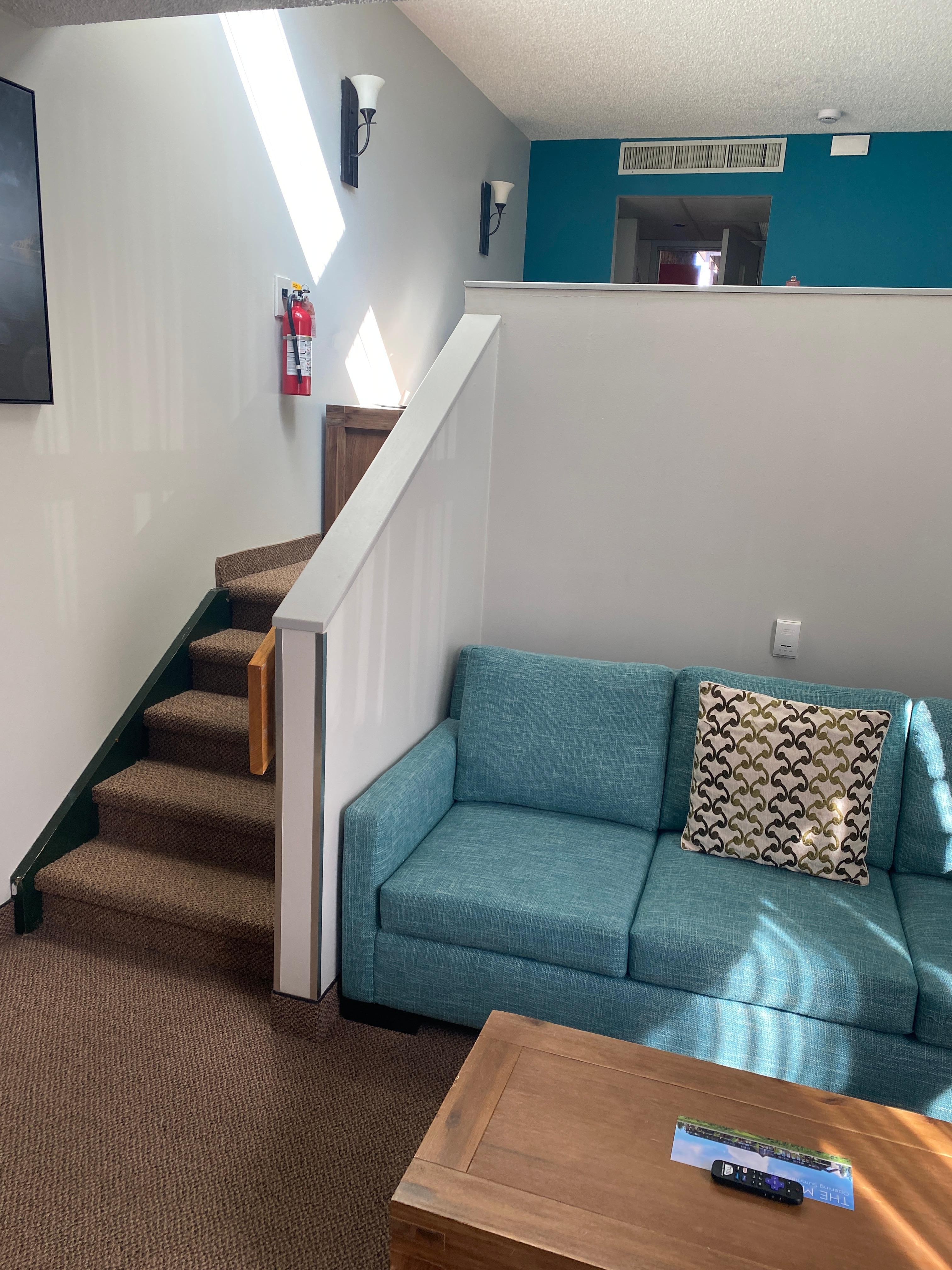 Steps down to sitting area