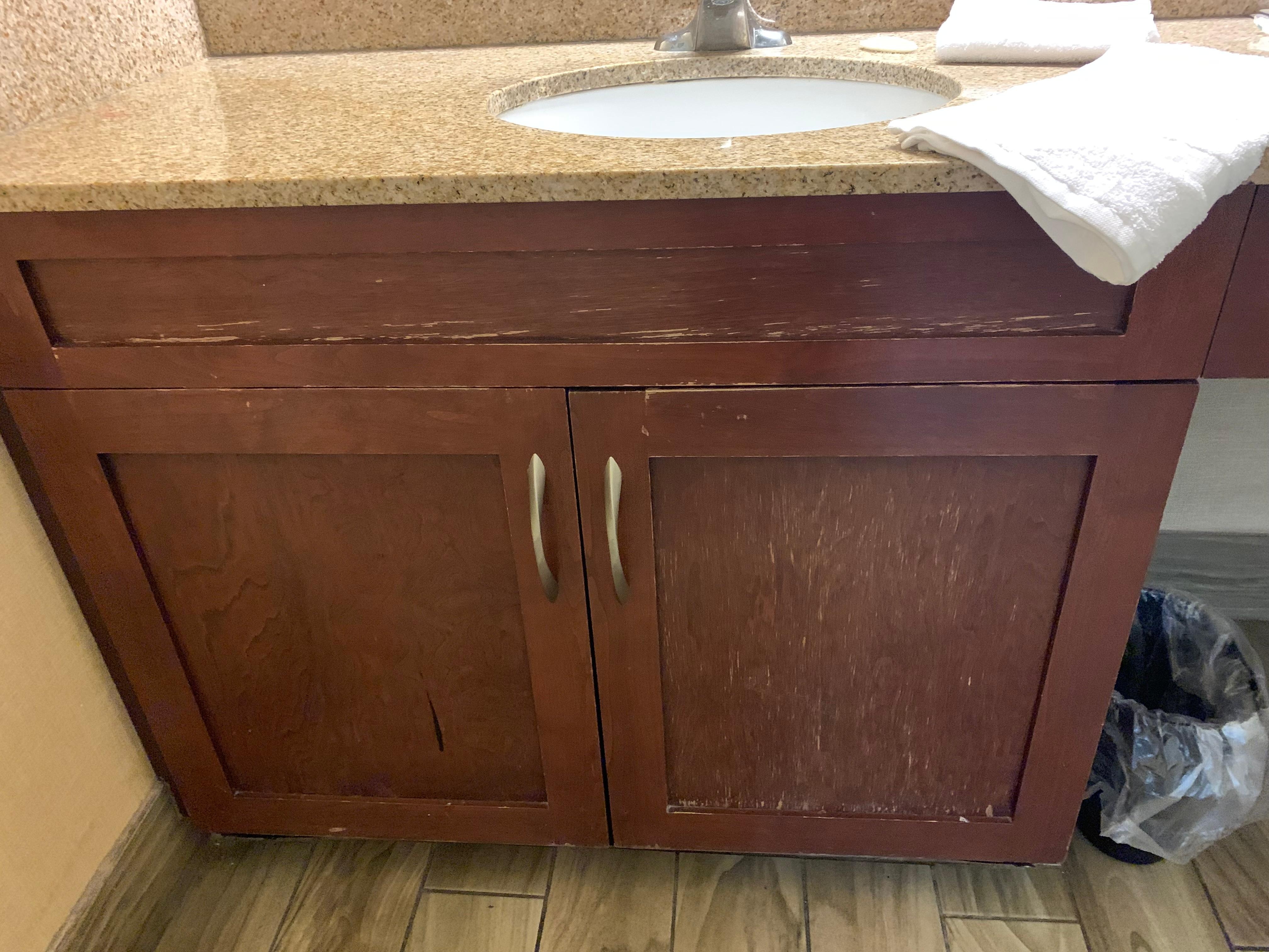 Notice the chips on the caninet.