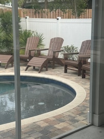 Outdoor furniture - listing photos show cushions but none existed.