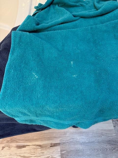 dirty towel (bleach stains and dirty)