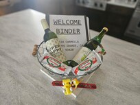 Cute welcome basket and binder