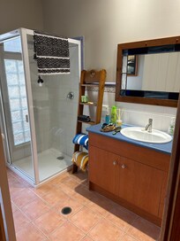 Clean bathroom with blow dryer etc.
