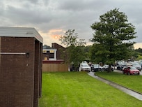 View from the executive room across the lawns to the side of the hotel to the car park