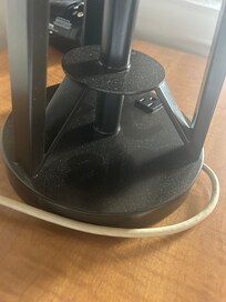 Dust on lamp next to bed