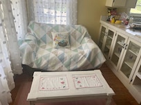 We sat on this cozy couch, ate popcorn and watched a “chick flick”