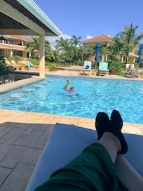 Pool side with swim up bar