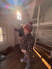 Enjoying the playhouse.