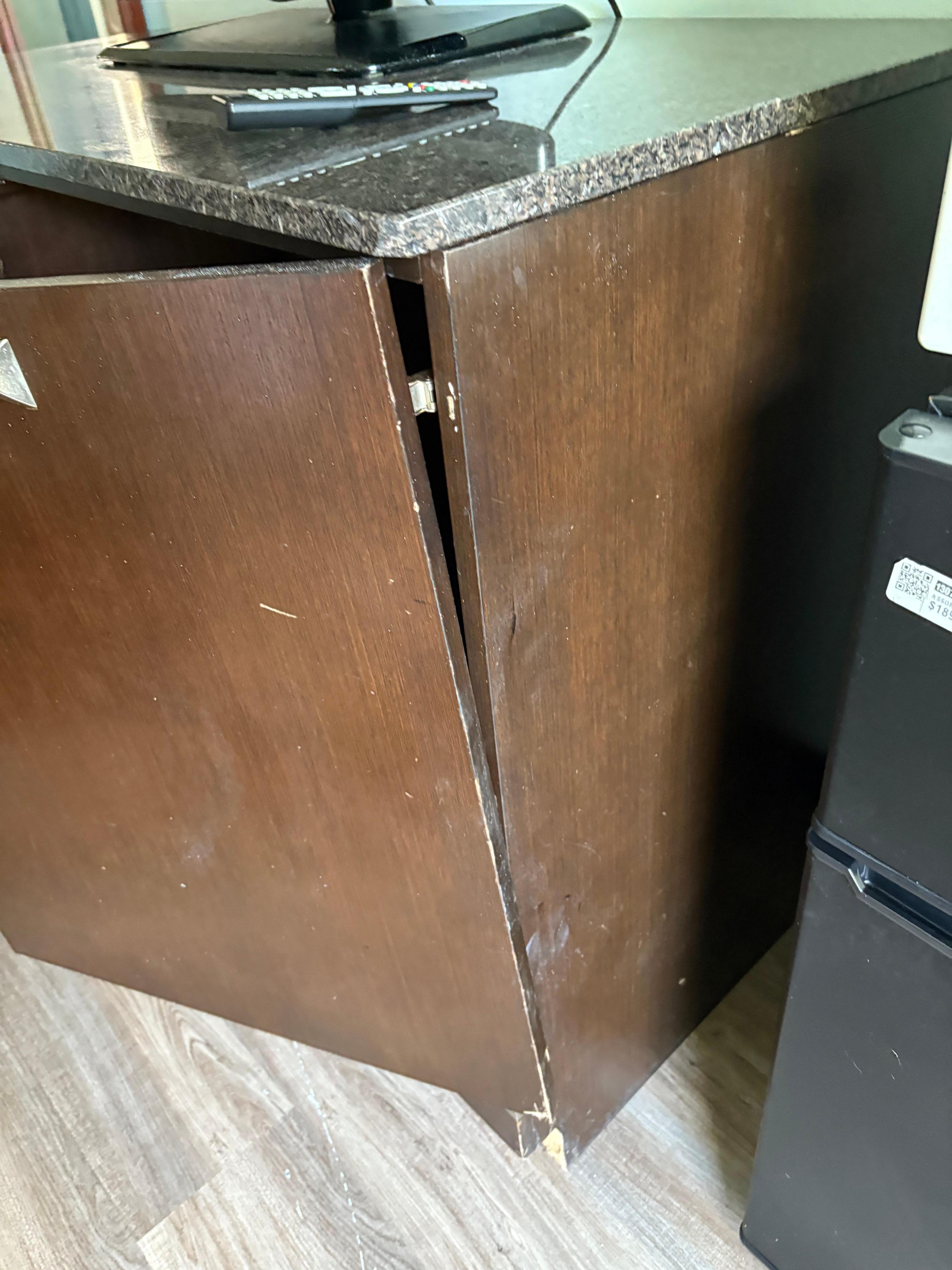 Broken door on TV stand
