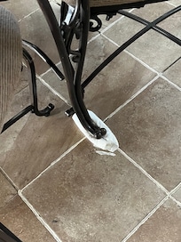 A table stabilized with a wadded up papertowel