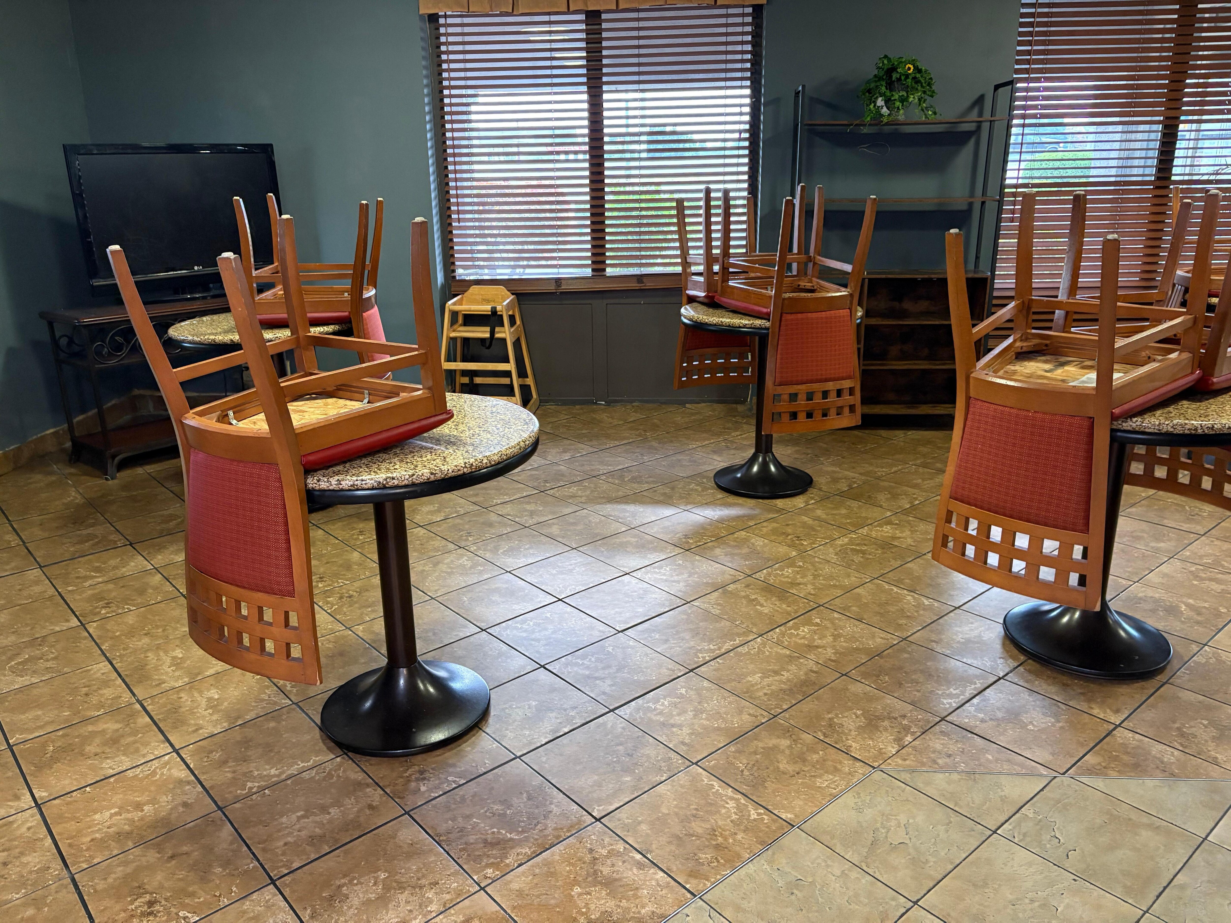 Chairs on table for breakfast!!???