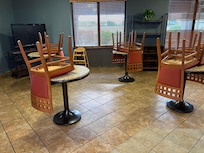 Chairs on table for breakfast!!???