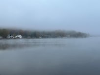 Fog lift over lake October 2025