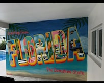 Check out this post card mural by the pool!