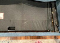 Under the couch cushions which was a bed.