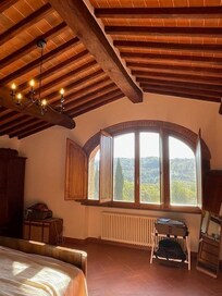 This room is all window and each with a view (The room is flooded with light)