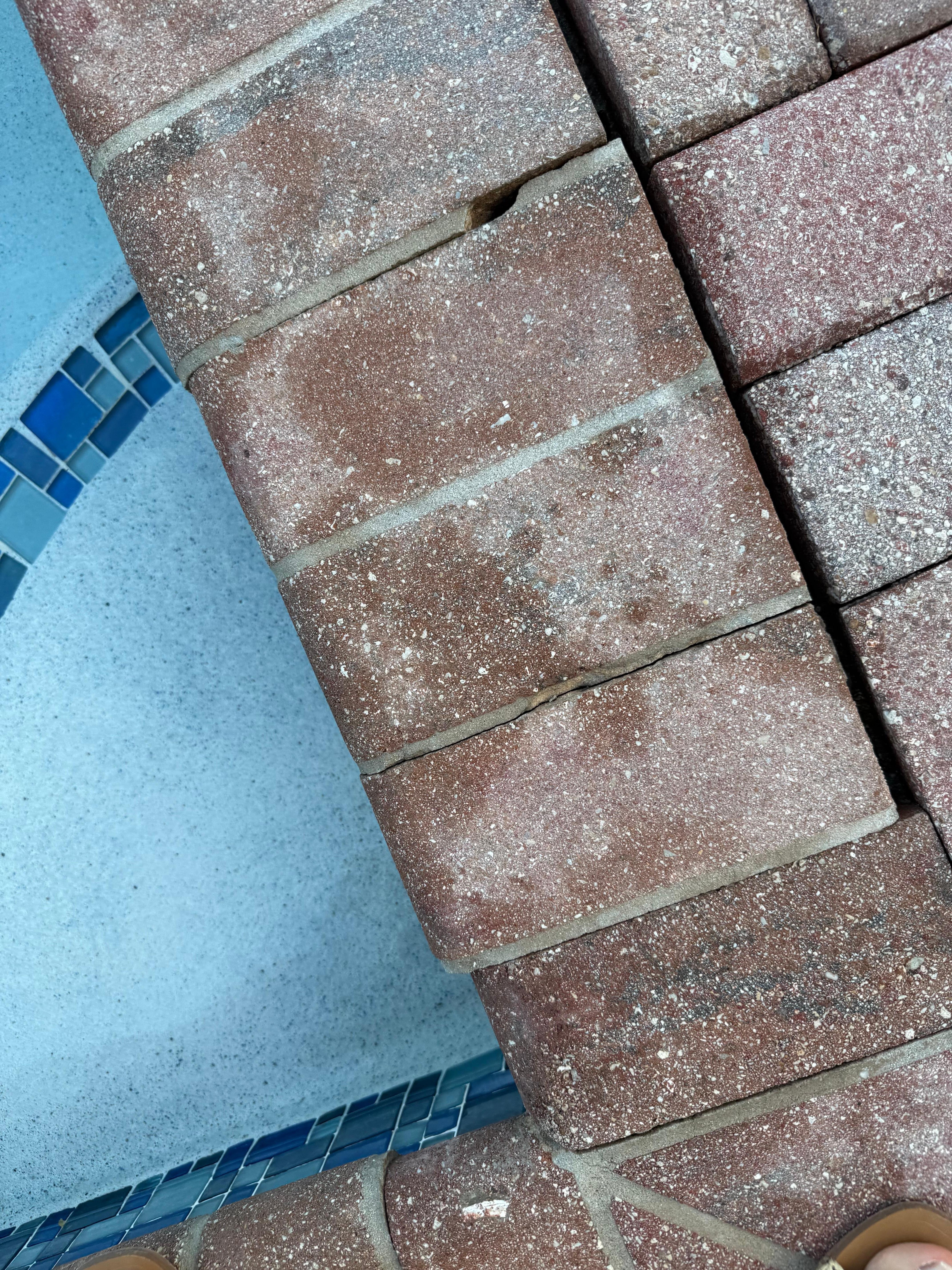 All blocks Arround the pool are loose.